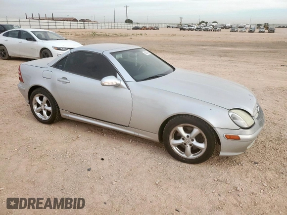 2001 Mercedes-Benz SLK 230/320 z VIN WDBKK65F91F228336, wystawiony jako Copart lot #56834915 z przebiegiem 127 224 mil mil oraz Szkoda całkowita • Salvage title. Historia ofert i sprzedaży dostępna na DreamBid. Obrazek 4.