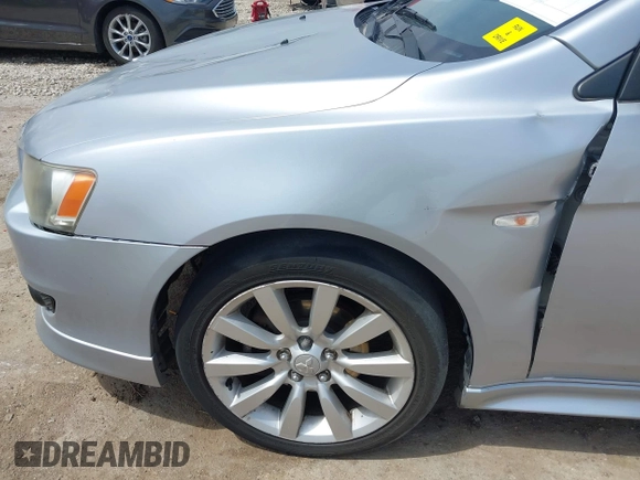2008 Mitsubishi Lancer GTS with VIN JA3AU86U28U026507, listed as a IAAI auction lot 42033357 with 153,589 mi miles. Bid and sale history available at carsss.com. Image 6.