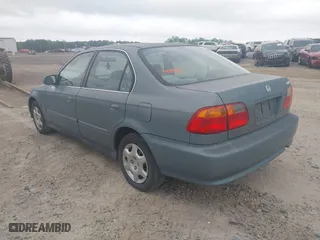 2000 Honda Civic EX with VIN 2HGEJ8648YH601225, listed as a IAAI auction lot 41945291 with 112,853 mi miles. Bid and sale history available at carsss.com. Image 3.