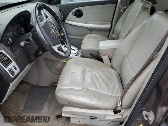 2007 Chevrolet Equinox LT z VIN 2CNDL73F976119101, wystawiony jako Copart lot #57047295 z przebiegiem 128 440 mil mil oraz Szkoda całkowita • Salvage title. Historia ofert i sprzedaży dostępna na DreamBid. Obrazek 7.