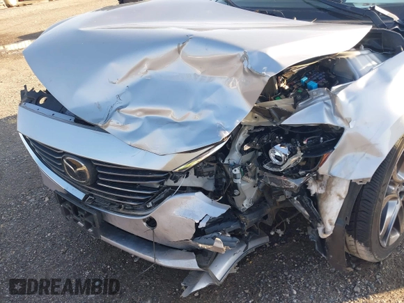 2017 Mazda 6 Grand Touring with VIN JM1GL1W50H1132261, listed as a IAAI auction lot 41930610 with 54,431 mi miles and . Bid and sale history available at DreamBid. Image 6.