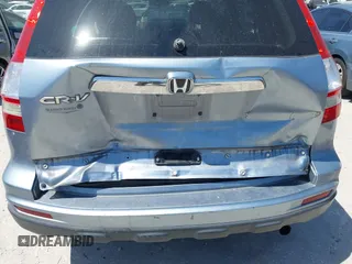 2010 Honda CR-V EX with VIN 5J6RE3H50AL006031, listed as a IAAI auction lot 42104423 with 209,418 mi miles and . Bid and sale history available at carsss.com. Image 6.
