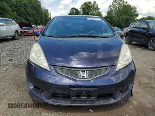 2010 Honda Fit Sport with VIN JHMGE8H44AC013385, listed as a Copart auction lot 63216515 with 228,358 mi miles and Salvage title. Bid and sale history available at DreamBid. Image 5.