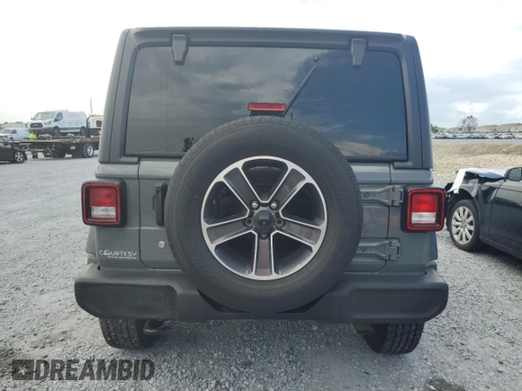 2019 Jeep Wrangler Unlimited Sport S with VIN 1C4HJXDG3KW583521, listed as a Copart auction lot 62835915 with 115,292 mi miles and Salvage title. Bid and sale history available at DreamBid. Image 6.