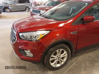 2018 Ford Escape SEL z VIN 1FMCU9HD7JUB52313, wystawiony jako IAAI lot #41901949 z przebiegiem 100 568 mil mil oraz . Historia ofert i sprzedaży dostępna na DreamBid. Obrazek 6.