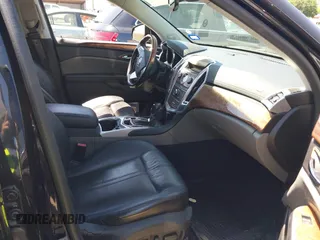 2011 Cadillac SRX Premium Collection z VIN 3GYFNCEY5BS597566, wystawiony jako IAAI lot #41983784 z przebiegiem 102 989 mil mil oraz . Historia ofert i sprzedaży dostępna na DreamBid. Obrazek 5.