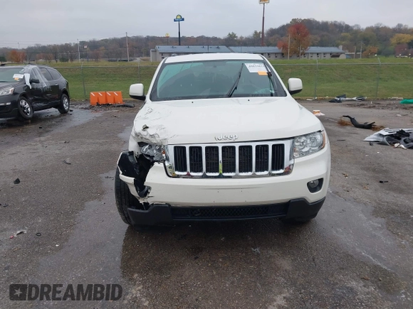 2012 Jeep Grand Cherokee Laredo with VIN 1C4RJFAG6CC297958, listed as a IAAI auction lot 40859811 with 213,499 mi miles. Bid and sale history available at carsss.com. Image 12.