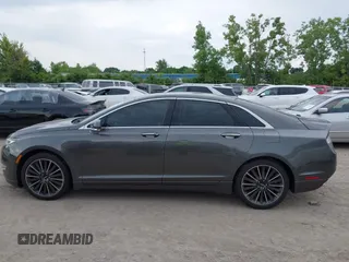 2016 Lincoln MKZ with VIN 3LN6L2J91GR630495, listed as a IAAI auction lot 42621918 with 65,554 mi miles and . Bid and sale history available at DreamBid. Image 14.
