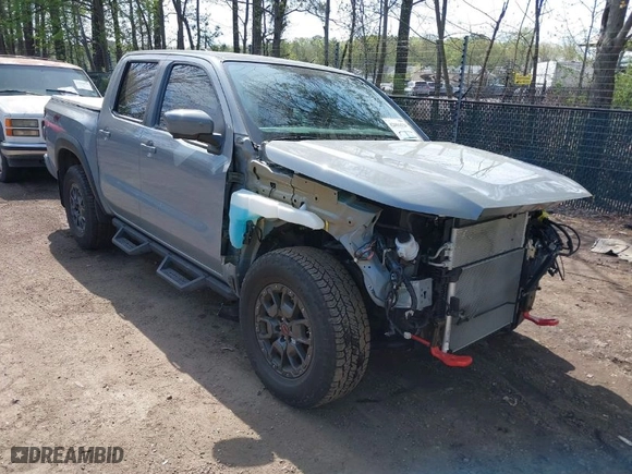 2023 Nissan Frontier PRO-4X with VIN 1N6ED1EKXPN674662, listed as a IAAI auction lot 42001624 with 24,928 mi miles. Bid and sale history available at carsss.com. Image 1.