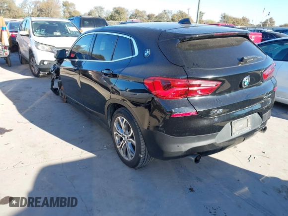 2019 BMW X2 sDrive28i with VIN WBXYJ3C50KEP77327, listed as a IAAI auction lot 40922194 with 94,672 mi miles. Bid and sale history available at carsss.com. Image 3.