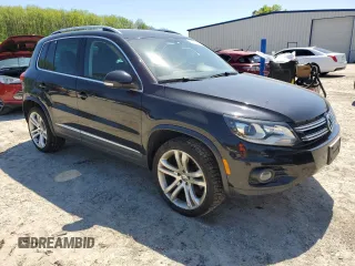 2012 Volkswagen Tiguan SEL with VIN WVGAV7AX2CW538660, listed as a Copart auction lot 52070165 with 111,673 mi miles and Clean Title. Bid and sale history available at DreamBid. Image 4.