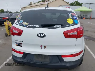 2013 Kia Sportage LX with VIN KNDPBCA21D7356092, listed as a IAAI auction lot 42111086 with 102,521 mi miles and . Bid and sale history available at carsss.com. Image 16.