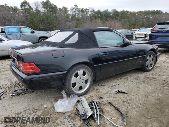 1999 Mercedes-Benz SL-Class with VIN WDBFA68F0XF184008, listed as a Copart auction lot 84998014 with 74,809 mi miles and Salvage Title. Bid and sale history available at carsss.com. Image 3.