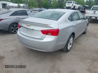 2014 Chevrolet Impala LT with VIN 2G1125S3XE9114130, listed as a IAAI auction lot 42128077 with 209,391 mi miles and . Bid and sale history available at DreamBid. Image 4.