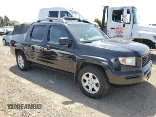 2006 Honda Ridgeline RTL with VIN 2HJYK16596H566552, listed as a Copart auction lot 57516525 with 192,023 mi miles and Salvage Title. Bid and sale history available at DreamBid. Image 4.