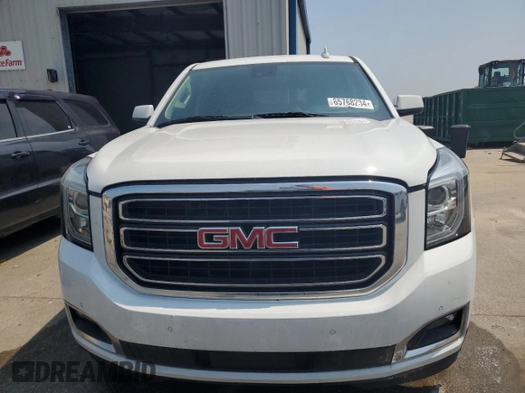 2020 GMC Yukon SLT with VIN 1GKS1BKC0LR243224, listed as a Copart auction lot 65768234 with 129,702 mi miles and Salvage Title. Bid and sale history available at DreamBid. Image 5.