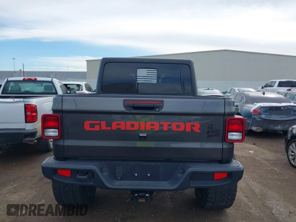 2023 Jeep Gladiator Sport S z VIN 1C6HJTAG9PL554845, wystawiony jako IAAI lot #41312360 z przebiegiem 18 077 mil mil oraz . Historia ofert i sprzedaży dostępna na DreamBid. Obrazek 17.