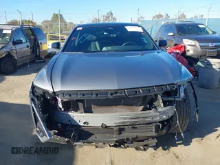 2024 Cadillac LYRIQ Sport z VIN 1GYKPTRL7RZ110193, wystawiony jako IAAI lot #41681140 z przebiegiem 14 218 mil mil oraz . Historia ofert i sprzedaży dostępna na DreamBid. Obrazek 12.