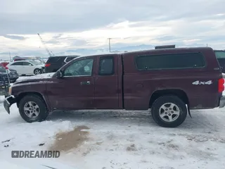2005 Dodge Dakota SLT with VIN 1D7HW42N65S305733, listed as a IAAI auction lot 41289814 with 149,226 mi miles and . Bid and sale history available at DreamBid. Image 15.