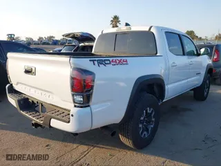 2023 Toyota Tacoma 4WD SR with VIN 3TMCZ5AN4PM541165, listed as a IAAI auction lot 41651949 with 43,074 mi miles. Bid and sale history available at carsss.com. Image 4.