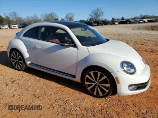 2012 Volkswagen Beetle 2.0T Turbo w/Sun/Snd/Nav PZEV with VIN 3VWVA7AT9CM656846, listed as a Copart auction lot 49466825 with 76,362 mi miles and Salvage Title. Bid and sale history available at carsss.com. Image 4.