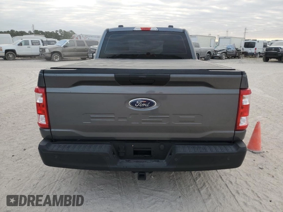 2023 Ford F-150 XL with VIN 1FTMF1C5XPKF21948, listed as a Copart auction lot 75918134 with 6,922 mi miles and Clean Title. Bid and sale history available at carsss.com. Image 6.
