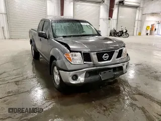 2008 Nissan Frontier SE z VIN 1N6AD06WX8C401437, wystawiony jako Copart lot #59941525 z przebiegiem 132 721 mil mil oraz Szkoda całkowita • Salvage title. Historia ofert i sprzedaży dostępna na DreamBid. Obrazek 13.