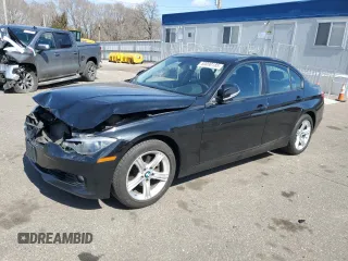 2014 BMW 3 Series 328i xDrive with VIN WBA3B3C58EJ977546, listed as a Copart auction lot 53090185 with 134,823 mi miles and Salvage Title. Bid and sale history available at DreamBid. Image 1.
