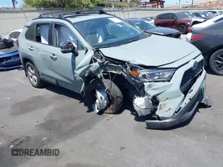 2021 Toyota RAV4 Hybrid XLE with VIN 2T3RWRFV8MW116853, listed as a IAAI auction lot 42338705 with 89,319 mi miles and . Bid and sale history available at DreamBid. Image 1.