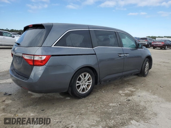 2012 Honda Odyssey EX-L with VIN 5FNRL5H63CB038980, listed as a Copart auction lot 41613155 with Not Provided miles and Salvage Title. Bid and sale history available at DreamBid. Image 3.