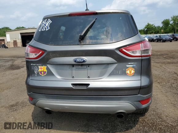 2014 Ford Escape SE с VIN 1FMCU9GX9EUD73493, выставлен на аукционе Copart как лот 60605385 с пробегом 123 236 миль миль и Списание • Salvage title. История ставок и продаж доступна на DreamBid. Изображение 6.