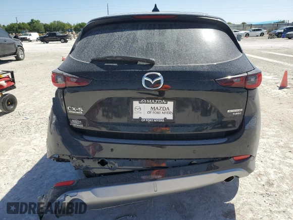 2024 Mazda CX-5 2.5 Turbo Signature with VIN JM3KFBXY2R0354346, listed as a Copart auction lot 49260525 with 9,571 mi miles and Salvage Title. Bid and sale history available at carsss.com. Image 6.