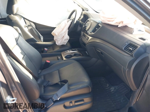 2022 Honda Pilot Special Edition with VIN 5FNYF5H25NB035016, listed as a IAAI auction lot 41248194 with 30,039 mi miles and . Bid and sale history available at DreamBid. Image 5.