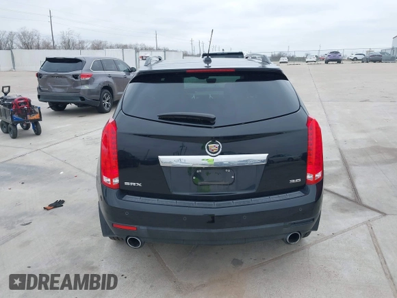 2015 Cadillac SRX Premium Collection z VIN 3GYFNDE3XFS576695, wystawiony jako IAAI lot #41612836 z przebiegiem Nie podano mil oraz . Historia ofert i sprzedaży dostępna na DreamBid. Obrazek 16.