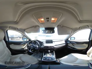 2018 Mazda CX-9 Touring with VIN JM3TCBCY3J0220372, listed as a IAAI auction lot 42405192 with 104,556 mi miles and . Bid and sale history available at DreamBid. Image 18.