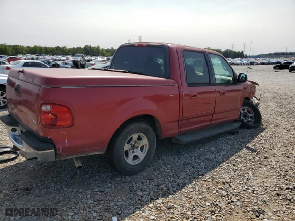 2001 Ford F-150 SuperCrew XLT with VIN 1FTRW07L91KE48149, listed as a Copart auction lot 70670704 with 0 mi miles and Salvage Title. Bid and sale history available at carsss.com. Image 3.