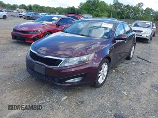 2012 Kia Optima LX with VIN 5XXGM4A77CG033361, listed as a IAAI auction lot 42210159 with 214,137 mi miles and . Bid and sale history available at carsss.com. Image 2.