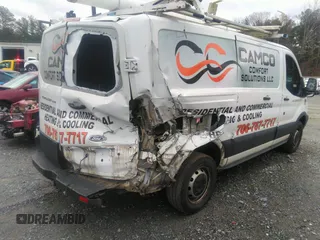 2016 Ford Transit Cargo with VIN 1FTYR1ZM7GKA14464, listed as a IAAI auction lot 41230405 with 120,604 mi miles and . Bid and sale history available at DreamBid. Image 4.