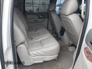 2013 Chevrolet Suburban LT with VIN 1GNSCJE05DR147101, listed as a IAAI auction lot 42336950 with 147,429 mi miles and . Bid and sale history available at DreamBid. Image 8.