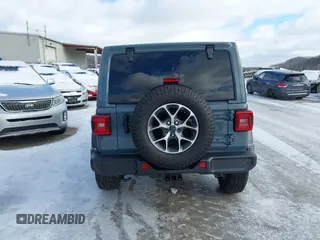 2024 Jeep Wrangler Sport S with VIN 1C4PJXDN2RW306332, listed as a IAAI auction lot 41036573 with 1,785 mi miles and . Bid and sale history available at DreamBid. Image 16.