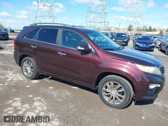 2011 Kia Sorento SX with VIN 5XYKW4A27BG163580, listed as a IAAI auction lot 41987362 with 172,097 mi miles. Bid and sale history available at carsss.com. Image 1.