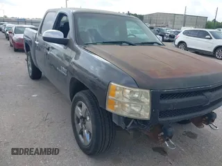 2011 Chevrolet Silverado 1500 LT with VIN 3GCPCSE09BG146325, listed as a IAAI auction lot 42182190 with 150,397 mi miles. Bid and sale history available at carsss.com. Image 1.