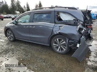 2021 Honda Odyssey Touring with VIN 5FNRL6H87MB033970, listed as a Copart auction lot 48928895 with 52,287 mi miles and Salvage Title. Bid and sale history available at carsss.com. Image 2.