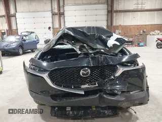 2025 Mazda CX-30 S Select Sport with VIN 3MVDMBBM2SM755621, listed as a IAAI auction lot 41945799 with 2,401 mi miles and . Bid and sale history available at DreamBid. Image 6.