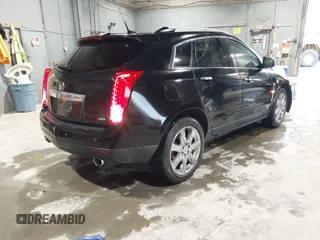 2012 Cadillac SRX Performance Collection z VIN 3GYFNEE37CS630391, wystawiony jako IAAI lot #42280516 z przebiegiem 137 330 mil mil oraz . Historia ofert i sprzedaży dostępna na DreamBid. Obrazek 4.