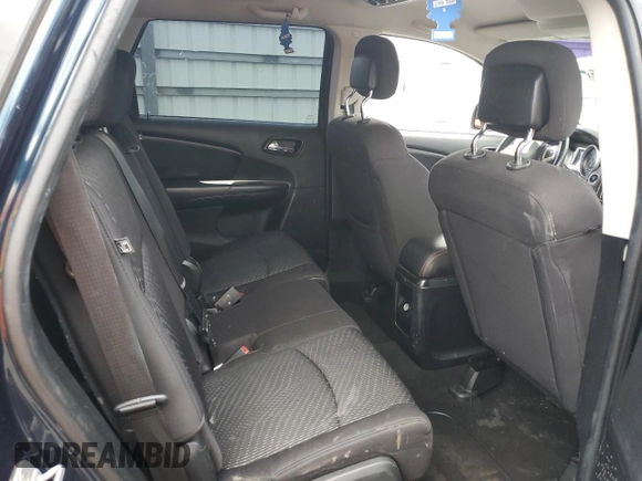 2013 Dodge Journey SE with VIN 3C4PDCAB7DT680055, listed as a Copart auction lot 58241435 with 199,620 mi miles and Salvage title. Bid and sale history available at DreamBid. Image 11.