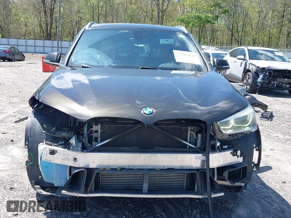 2016 BMW X1 xDrive28i with VIN WBXHT3C3XGP889833, listed as a IAAI auction lot 39118131 with 111,343 mi miles. Bid and sale history available at carsss.com. Image 6.