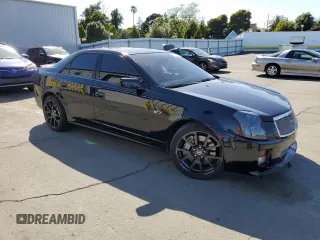 2004 Cadillac CTS-V z VIN 1G6DN57S440130637, wystawiony jako Copart lot #57805015 z przebiegiem 145 633 mil mil oraz Szkody całkowita. Historia ofert i sprzedaży dostępna na DreamBid. Obrazek 4.