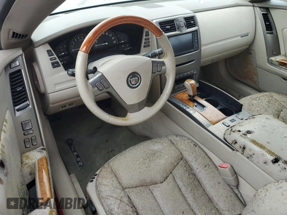 2005 Cadillac XLR z VIN 1G6YV34A855601016, wystawiony jako Copart lot #74436784 z przebiegiem Nie podano mil oraz Szkody całkowita. Historia ofert i sprzedaży dostępna na DreamBid. Obrazek 8.