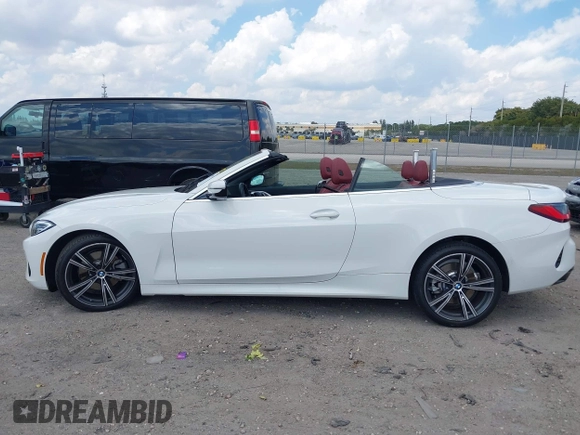 2024 BMW 4 Series 430i z VIN WBA23AT05RCP25894, wystawiony jako IAAI lot #41895019 z przebiegiem 7362 mil mil oraz . Historia ofert i sprzedaży dostępna na DreamBid. Obrazek 14.